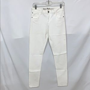 Alice and Olivia white skinny jeans